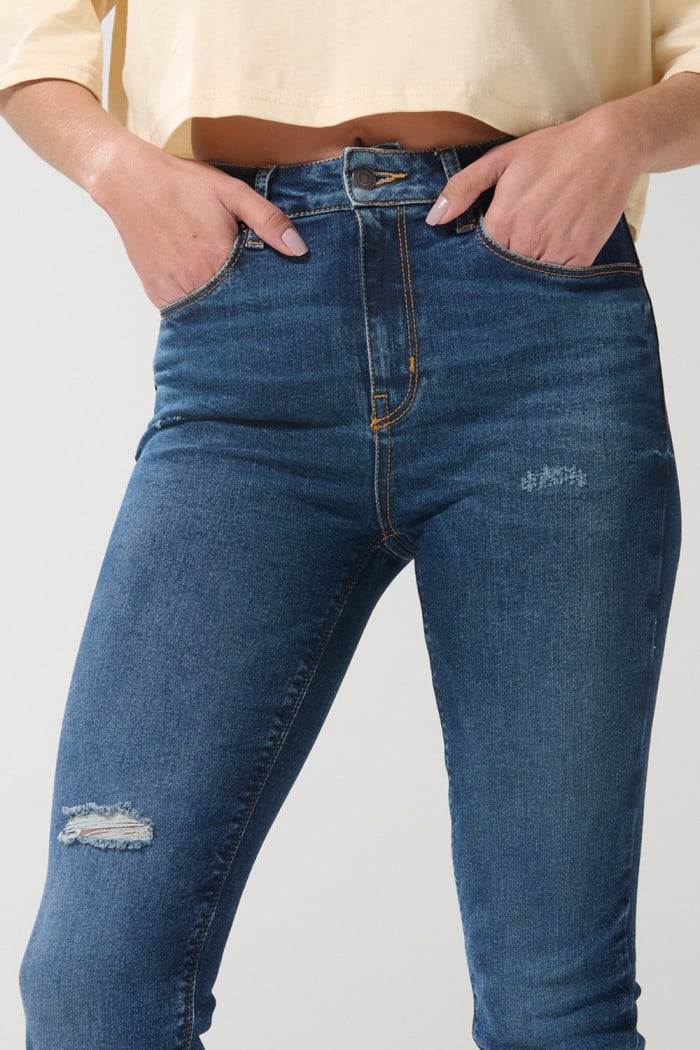 Jean jegging azul oscuro súper tiro alto con rotos en frente