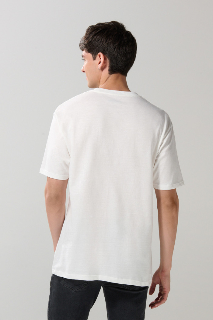 Camiseta manga corta crema con arte de Plaza Sésamo