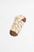 Medias tobilleras kakis con diseños de bananas