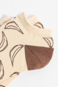 Medias tobilleras kakis con diseños de bananas