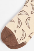 Medias tobilleras kakis con diseños de bananas