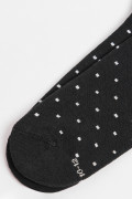 Medias cortas unicolores con estampado de puntos.