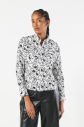 Blusa unicolor crop con diseños estampados y manga larga