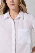 Blusa unicolor en algodón manga corta con bolsillo