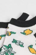 Medias tobilleras cremas con diseños de limones