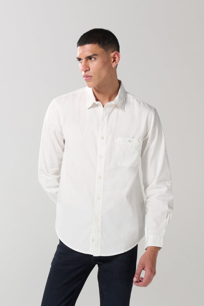 Camisa en algodón unicolor cuello sport collar con bolsillo