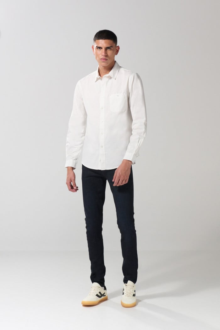 Camisa en algodón unicolor cuello sport collar con bolsillo
