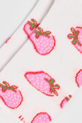 Medias cremas claras cortas con diseños de frutas