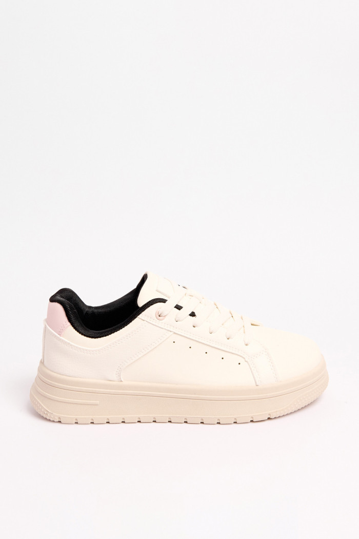 Tenis unicolores casuales con forro interno en contraste