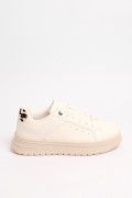 Tenis cremas casuales con diseño animal print posterior