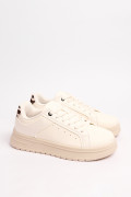 Tenis cremas casuales con diseño animal print posterior