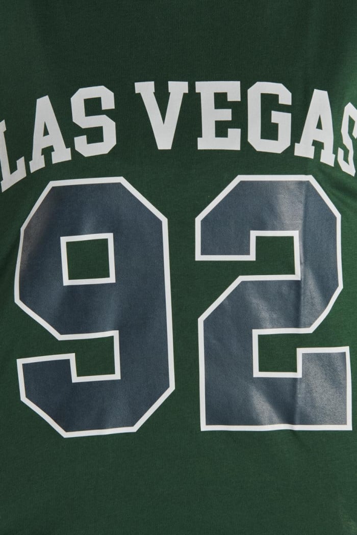 Camiseta manga corta unicolor con texto college de Las Vegas