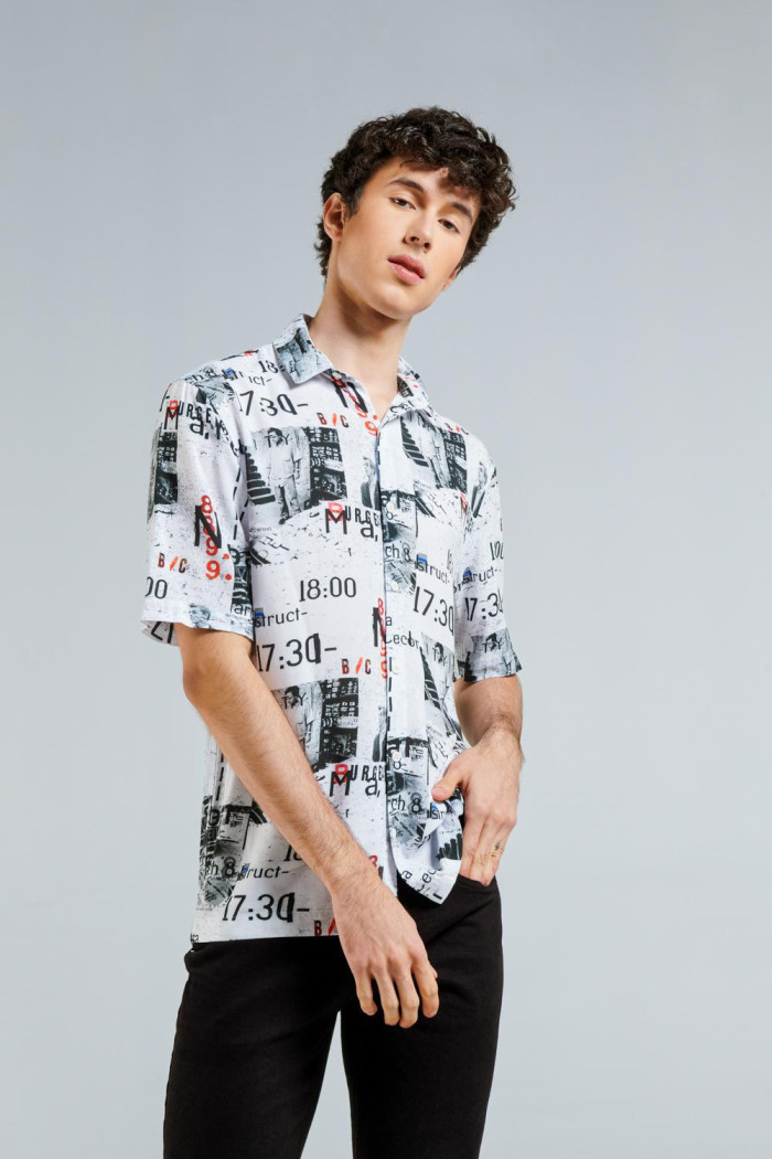 Camisa cuello sport collar en tela fluida 100% viscosa.