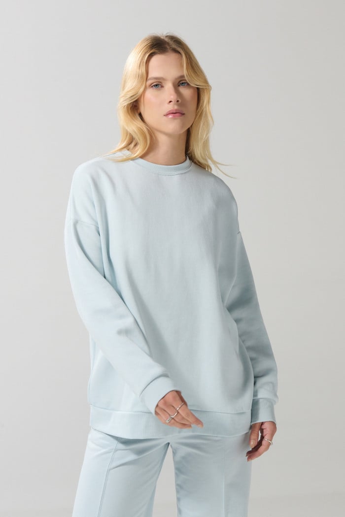 Buzo unicolor oversize con cuello redondo