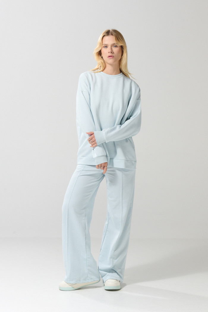 Buzo unicolor oversize con cuello redondo