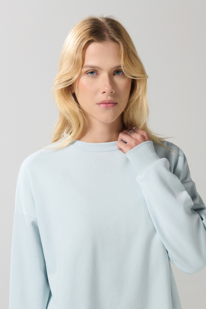 Buzo unicolor oversize con cuello redondo