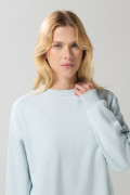 Buzo unicolor oversize con cuello redondo