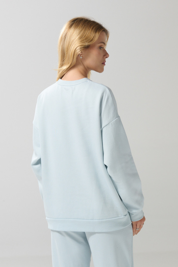 Buzo unicolor oversize con cuello redondo