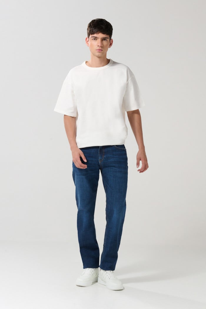Jean tiro bajo slim ajustado azul oscuro con cremallera
