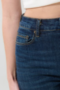 Jean jegging ajustado azul oscuro con tiro súper alto