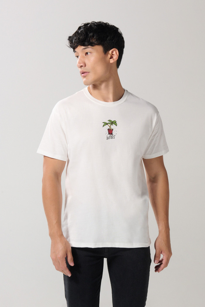 Camiseta manga corta crema con diseño de playa