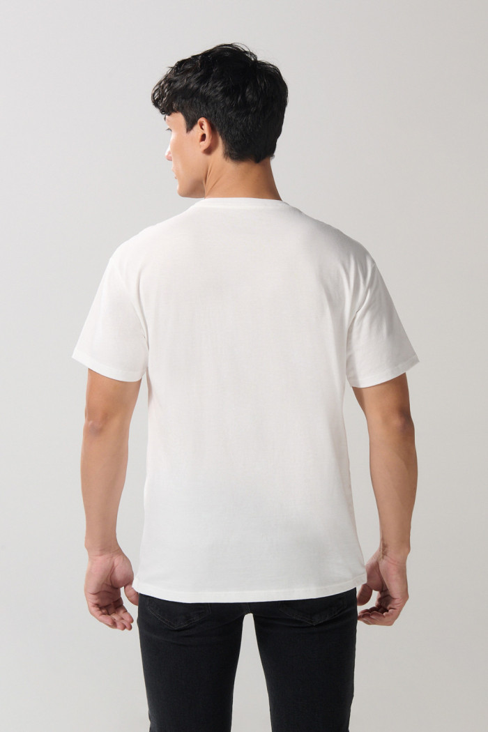 Camiseta manga corta crema con diseño de playa