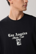 Camiseta oversize negra con diseños college y manga corta