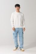 Buzo crema claro hombro rodado con cuello redondo