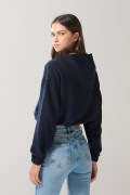 Buzo oversize azul intenso con elásticos y capota