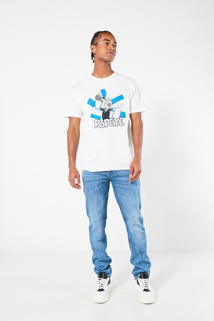 Camiseta crema clara cuello redondo con diseño de Popeye