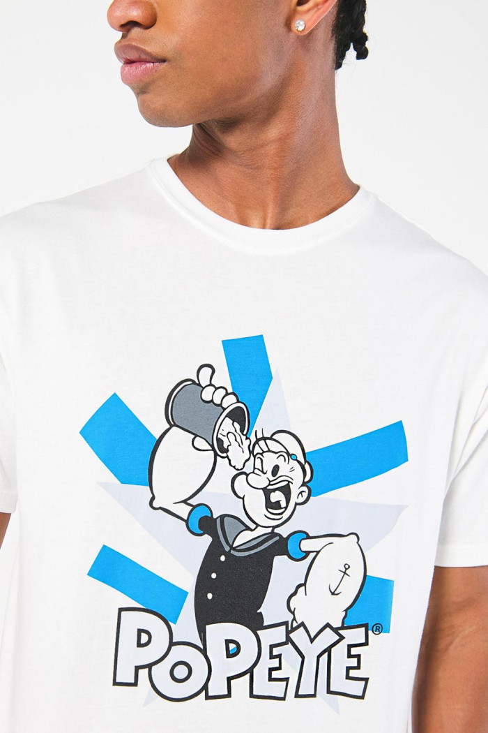 Camiseta crema clara cuello redondo con diseño de Popeye
