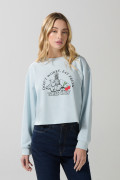 Buzo crop top unicolor con diseño de frutas