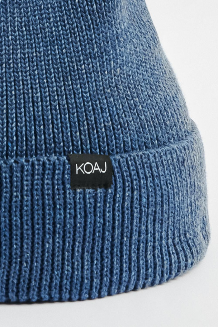 Gorro en tejido de terciopelo azul con doblez sencillo