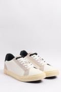 Tenis blancos casuales con suela antideslizante y contrastes