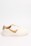 Tenis unicolores casuales con contrastes localizados