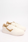 Tenis unicolores casuales con contrastes localizados