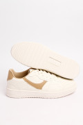 Tenis unicolores casuales con contrastes localizados