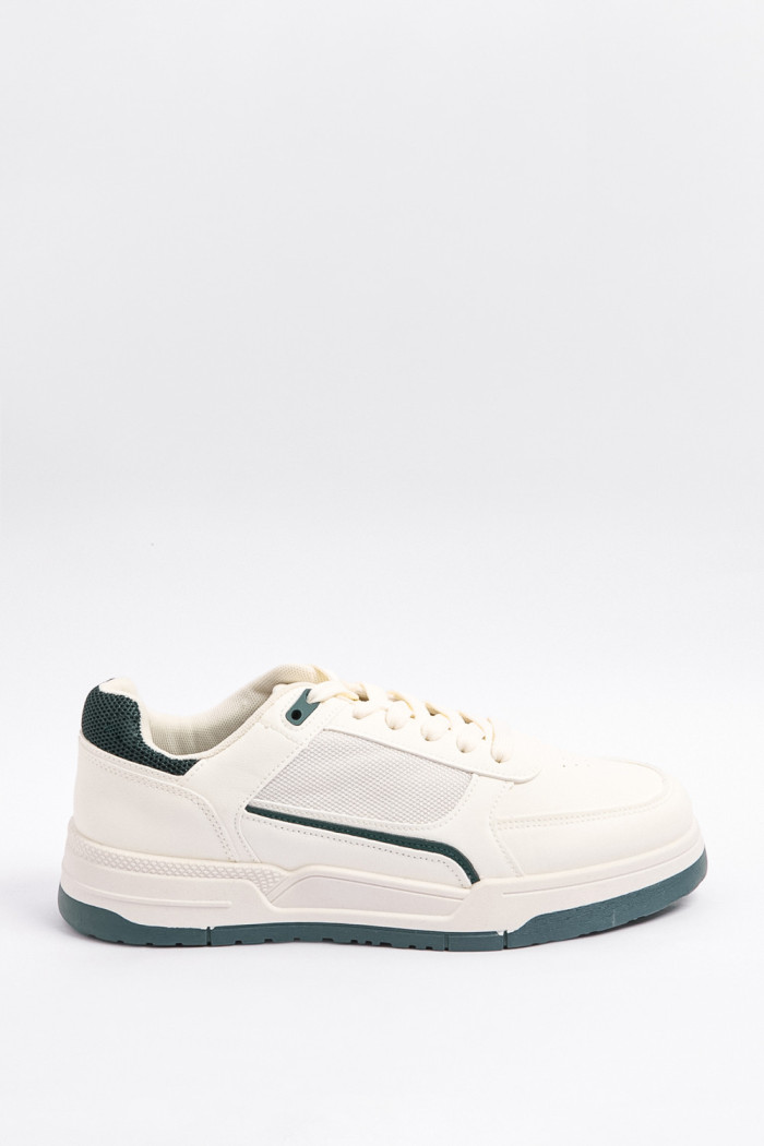 Tenis cremas casuales con diseños azules localizados