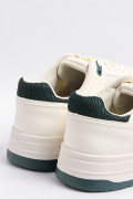 Tenis cremas casuales con diseños azules localizados