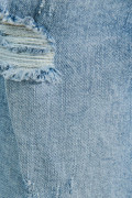 Jean mom tiro súper alto azul claro con rotos y desgastes