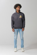 Buzo de Tom y Jerry oversize gris con cuello alto