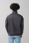 Buzo de Tom y Jerry oversize gris con cuello alto