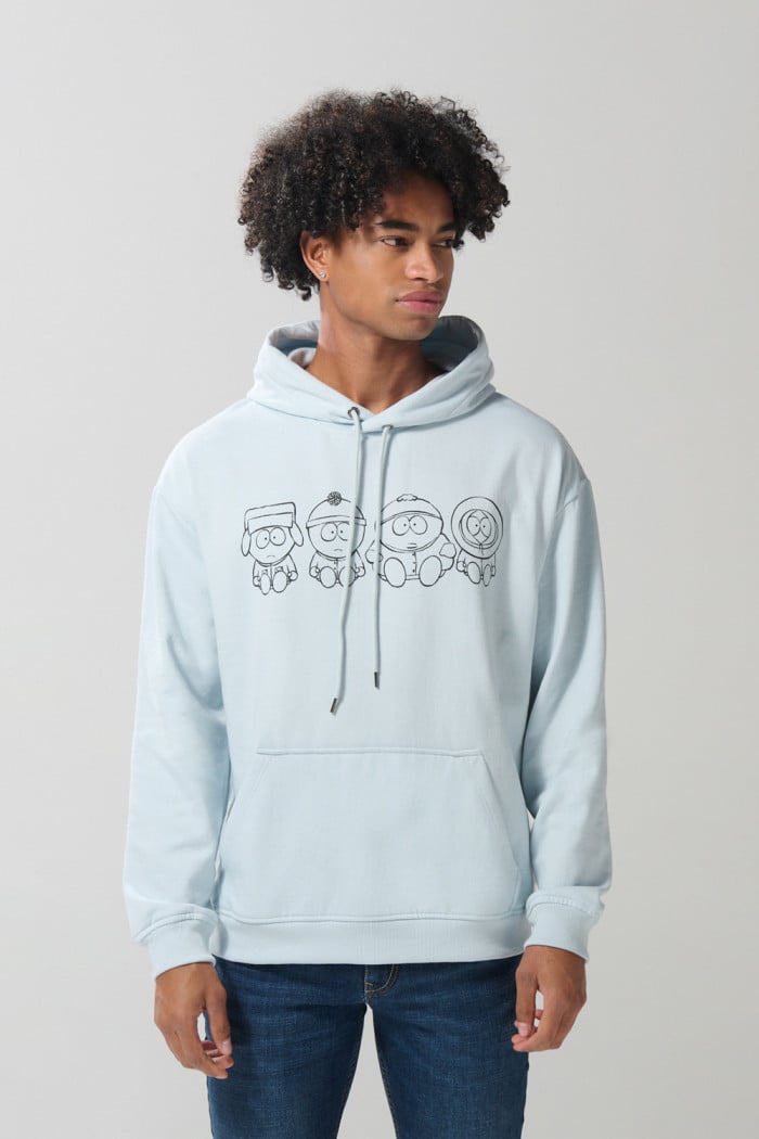 Buzo oversize con capota azul claro y diseño de South Park