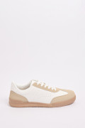 Tenis unicolores casuales con suelas planas y cortes