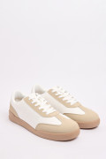 Tenis unicolores casuales con suelas planas y cortes