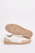 Tenis unicolores casuales con suelas planas y cortes