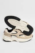 Tenis de plataforma kakis con suelas altas y cortes