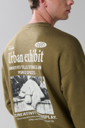 Buzo artístico urbano unicolor oversize cuello redondo
