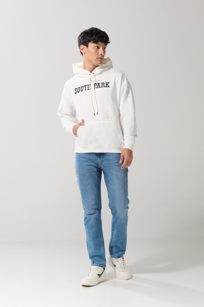 Buzo oversize crema de South Park con capota y bolsillo