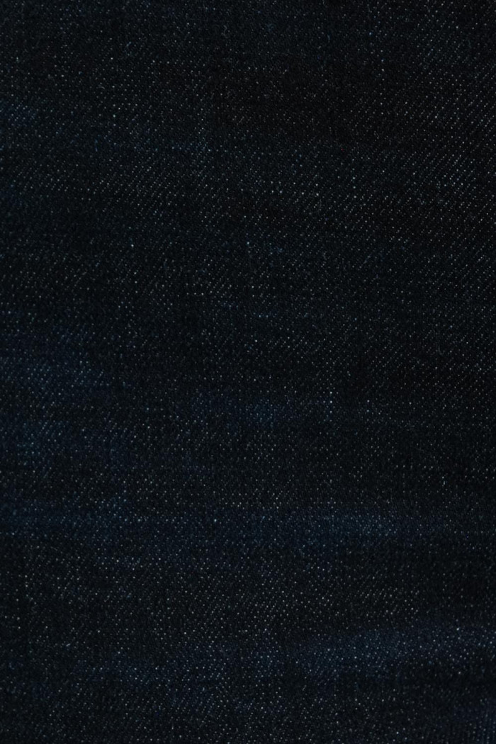 Jean jegging azul intenso ajustado con costuras y tiro alto